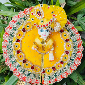 Festive special Yellow heavy dress with red and green lace combination with pagdi and choli