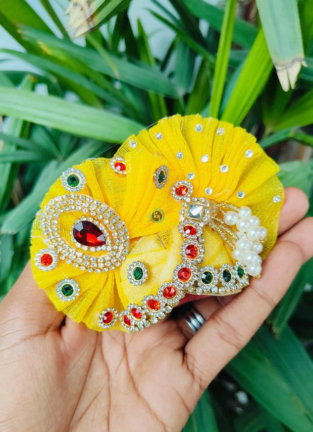 Festive special Yellow heavy dress with red and green lace combination with pagdi and choli